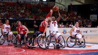 Andrea Woodson-Smith playing wheelchair basketball