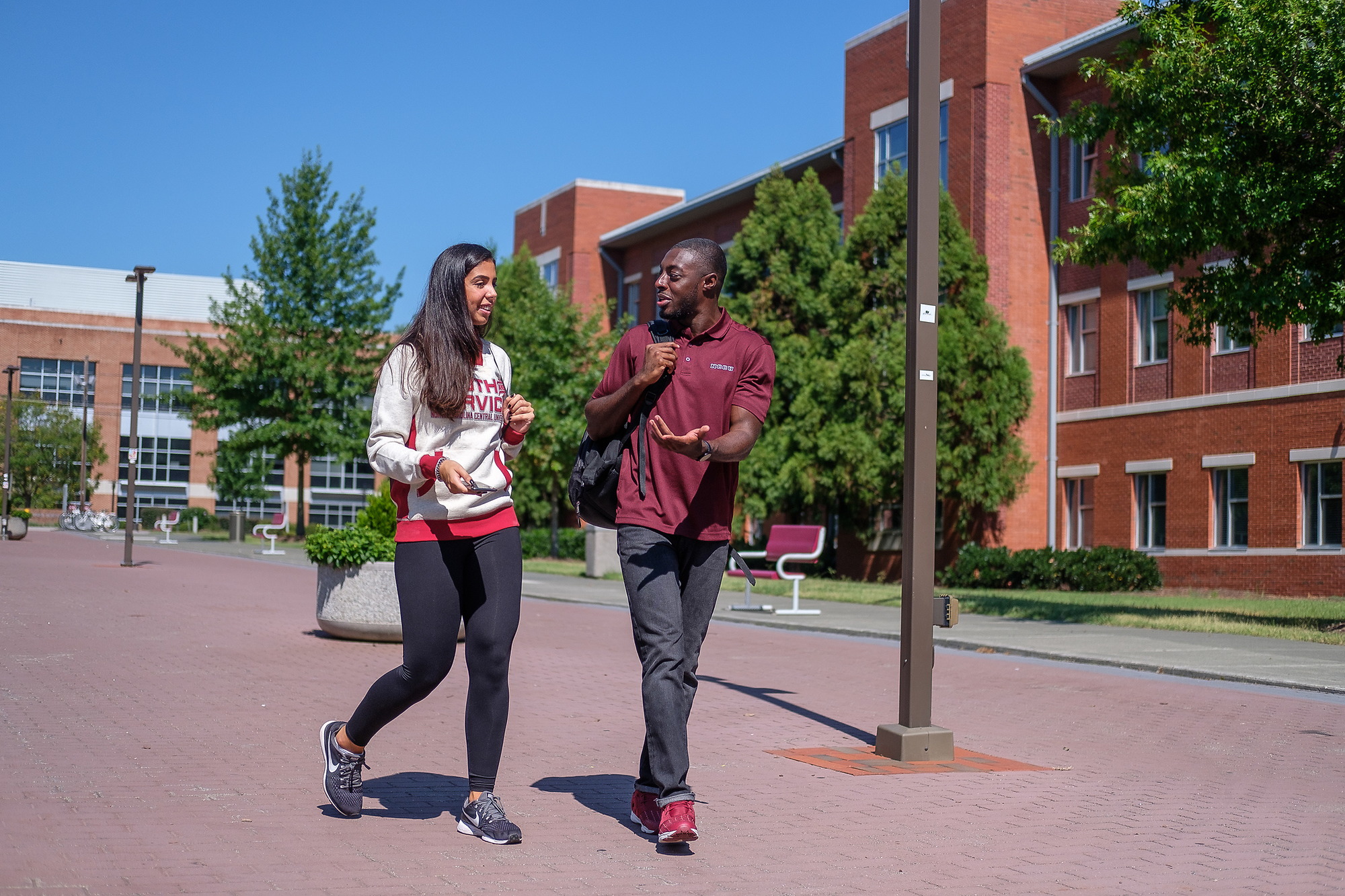 Transfered students are walking across campus
