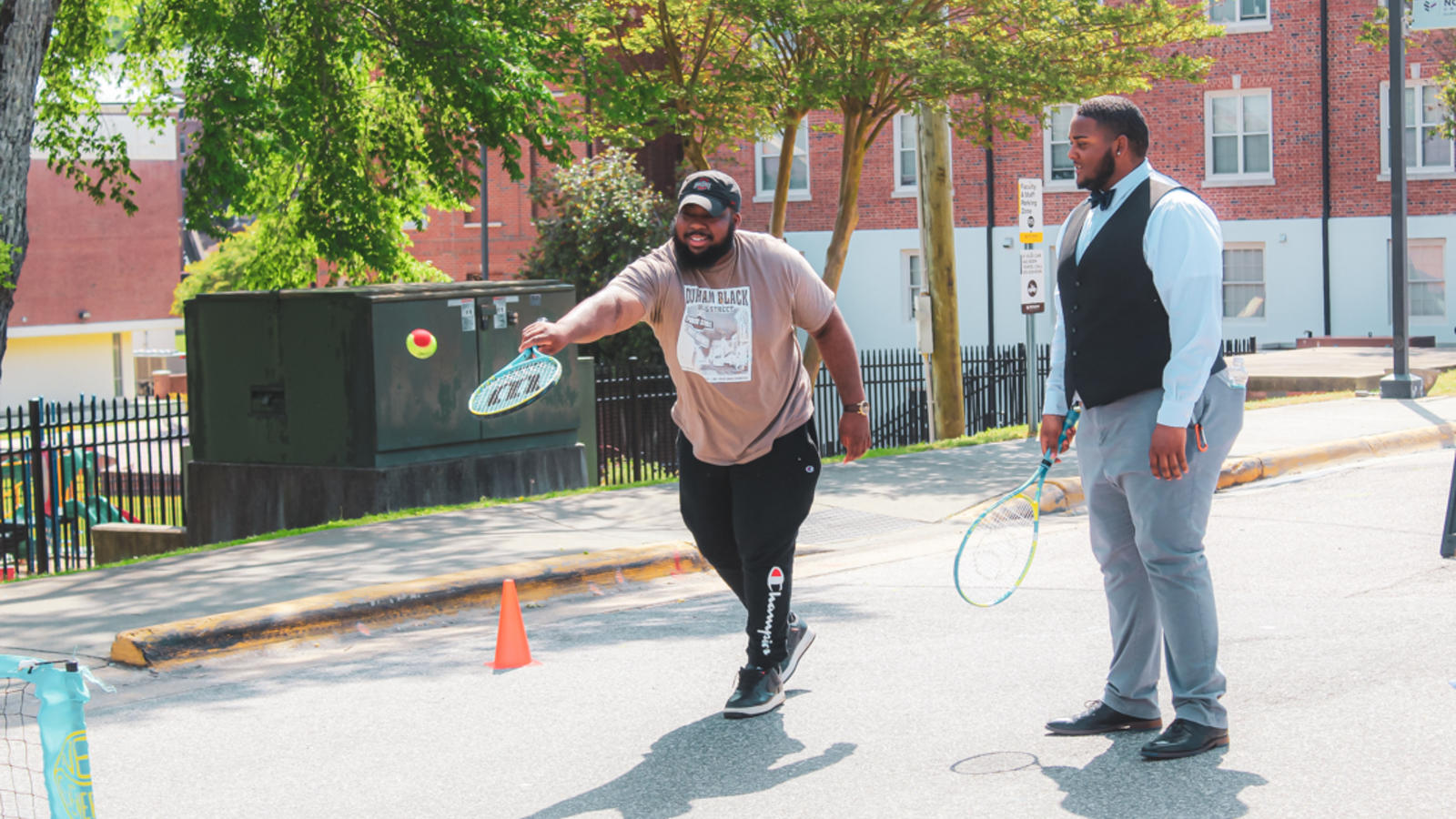 Students playing tennis