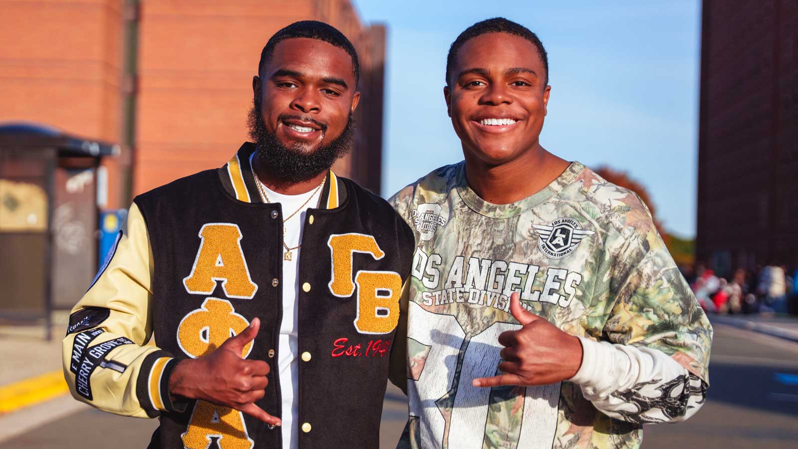 2 NCCU students posing on homecoming day
