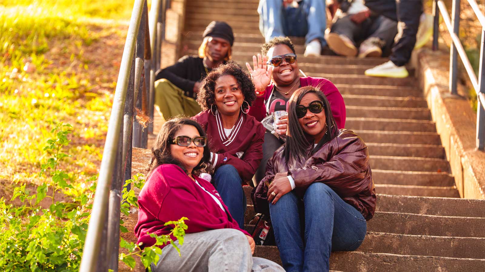 Group sitting during Homecoming