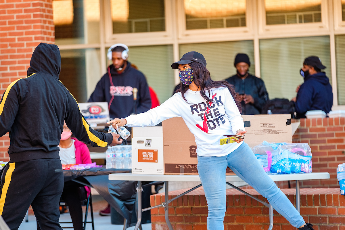 Students Handing Out Voting Flyers