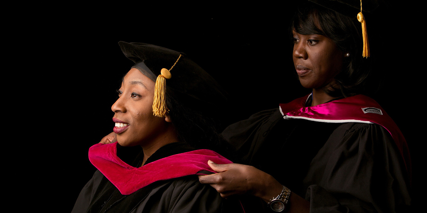 Two graduating students.