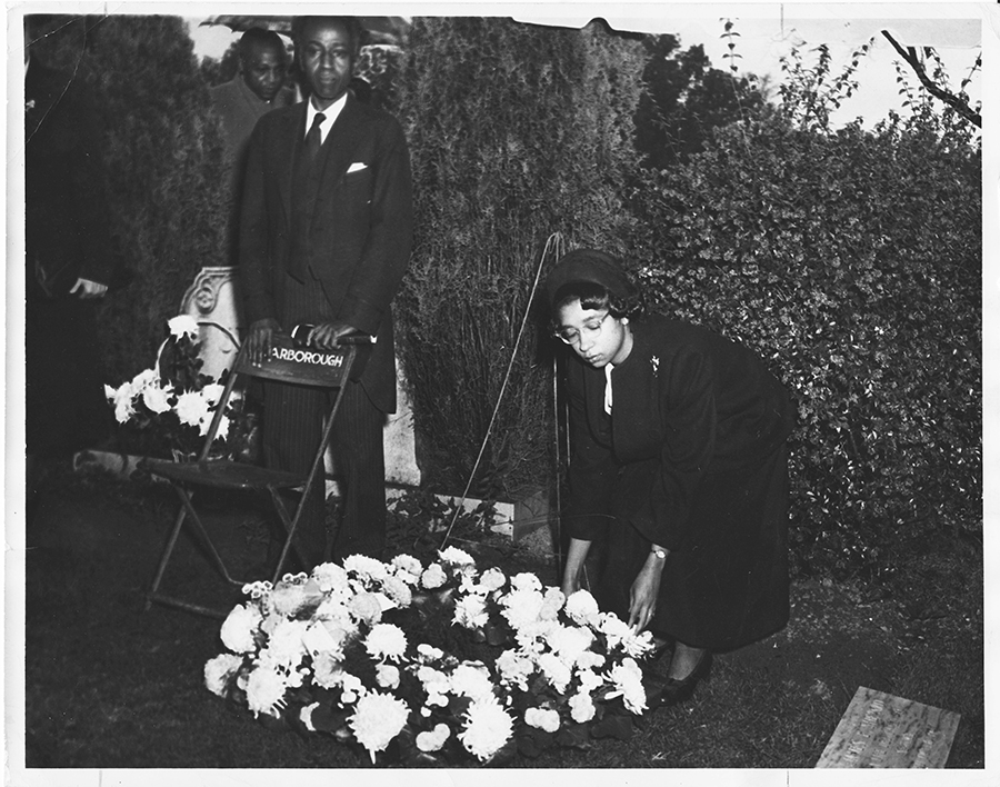 Carolyn Green Laying Wreath