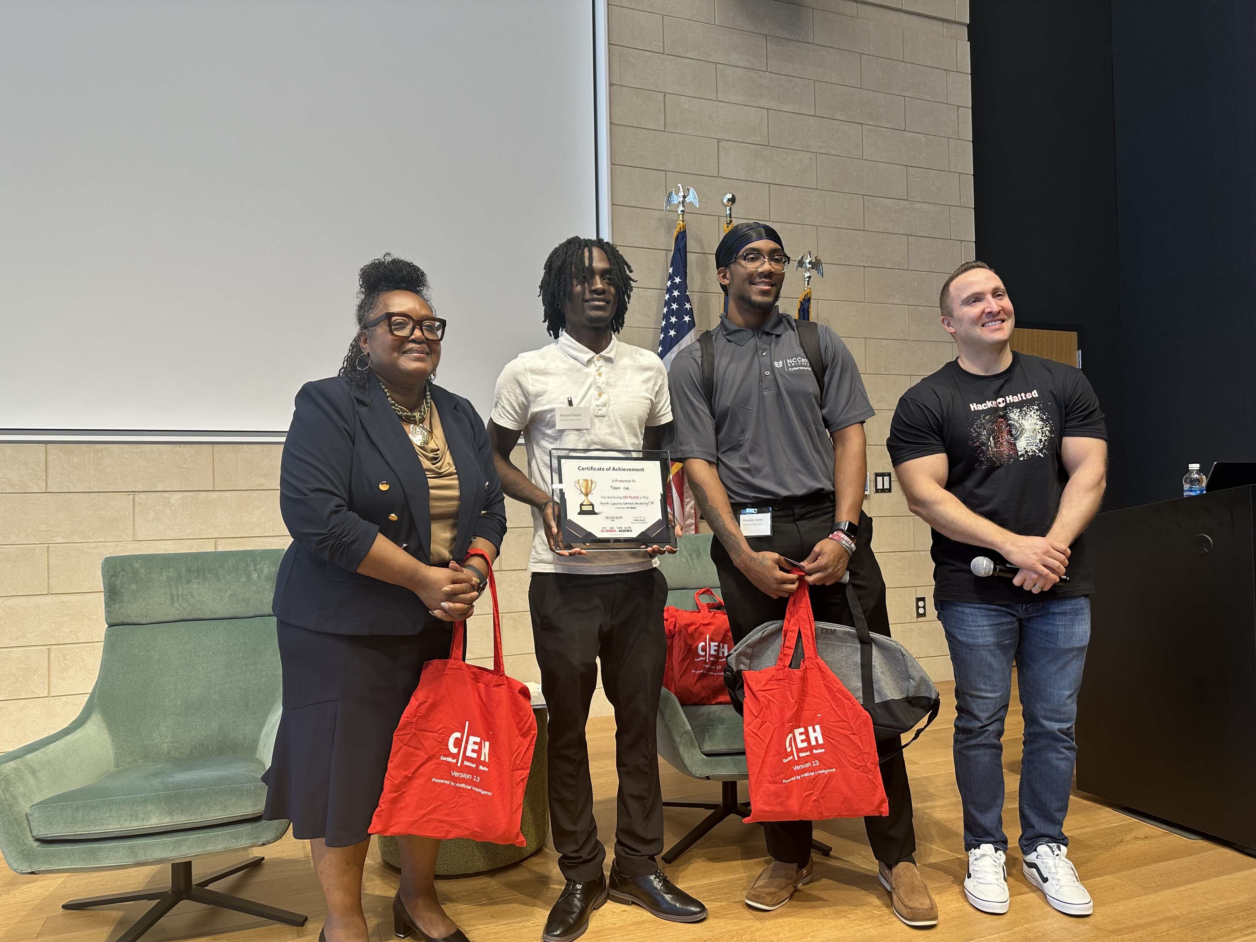 Photo of Cyber Hackathon winners on stage