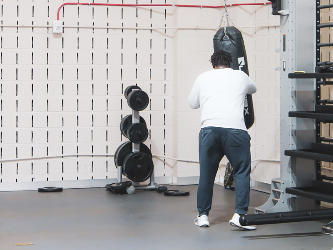 Student boxing a bag