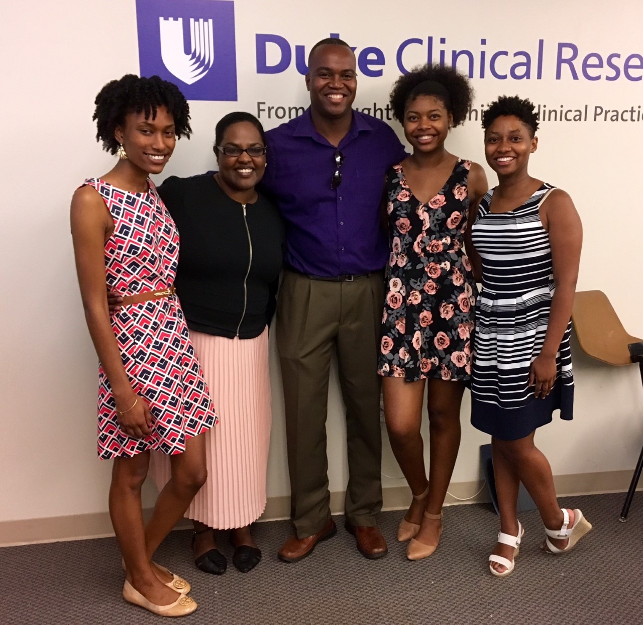 5 smiling people smiling at the Duke clinical research center