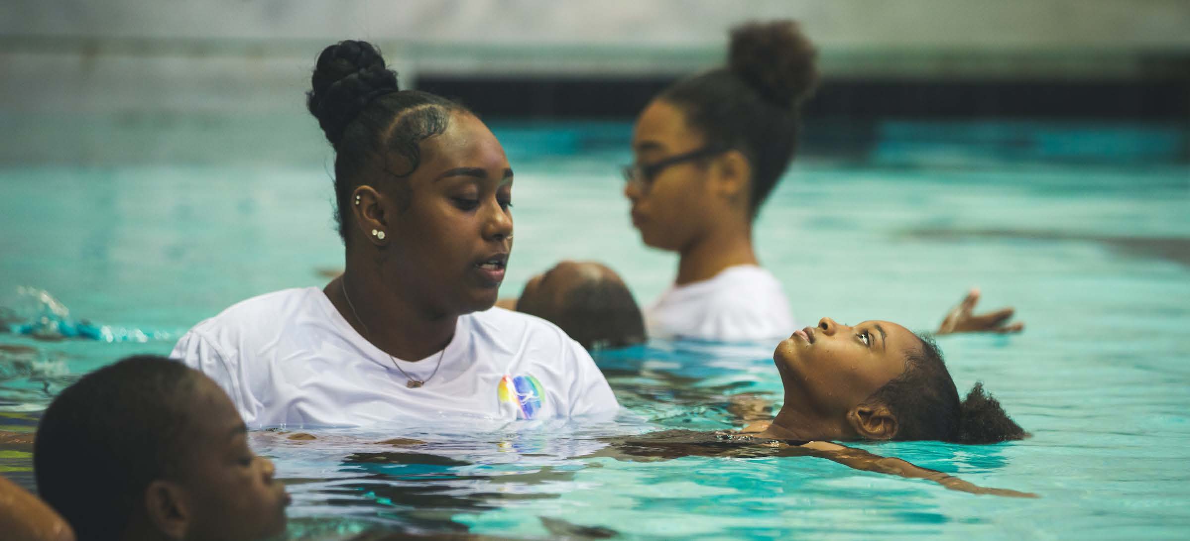 Kids learning to swim