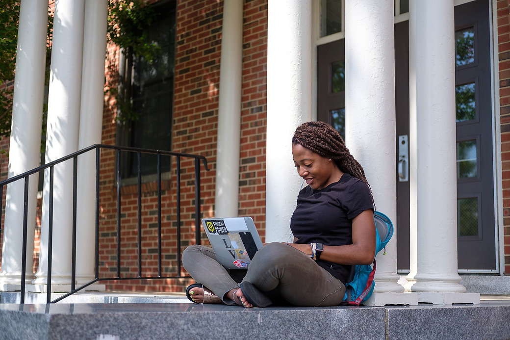 Female student using laptop