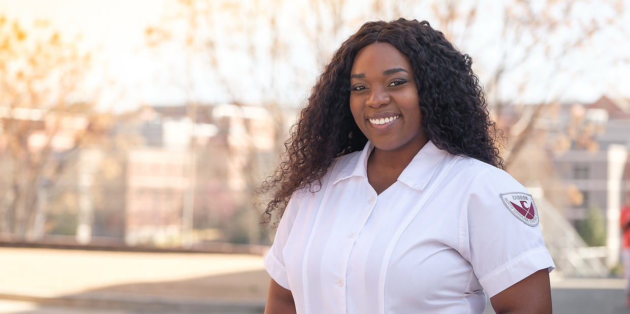 NCCU Nursing Student looking at the camera outside.
