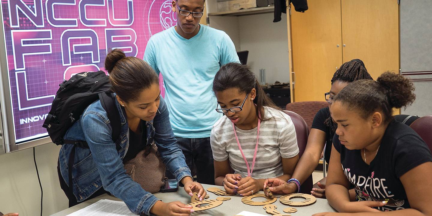 Fab Lab students working on project.