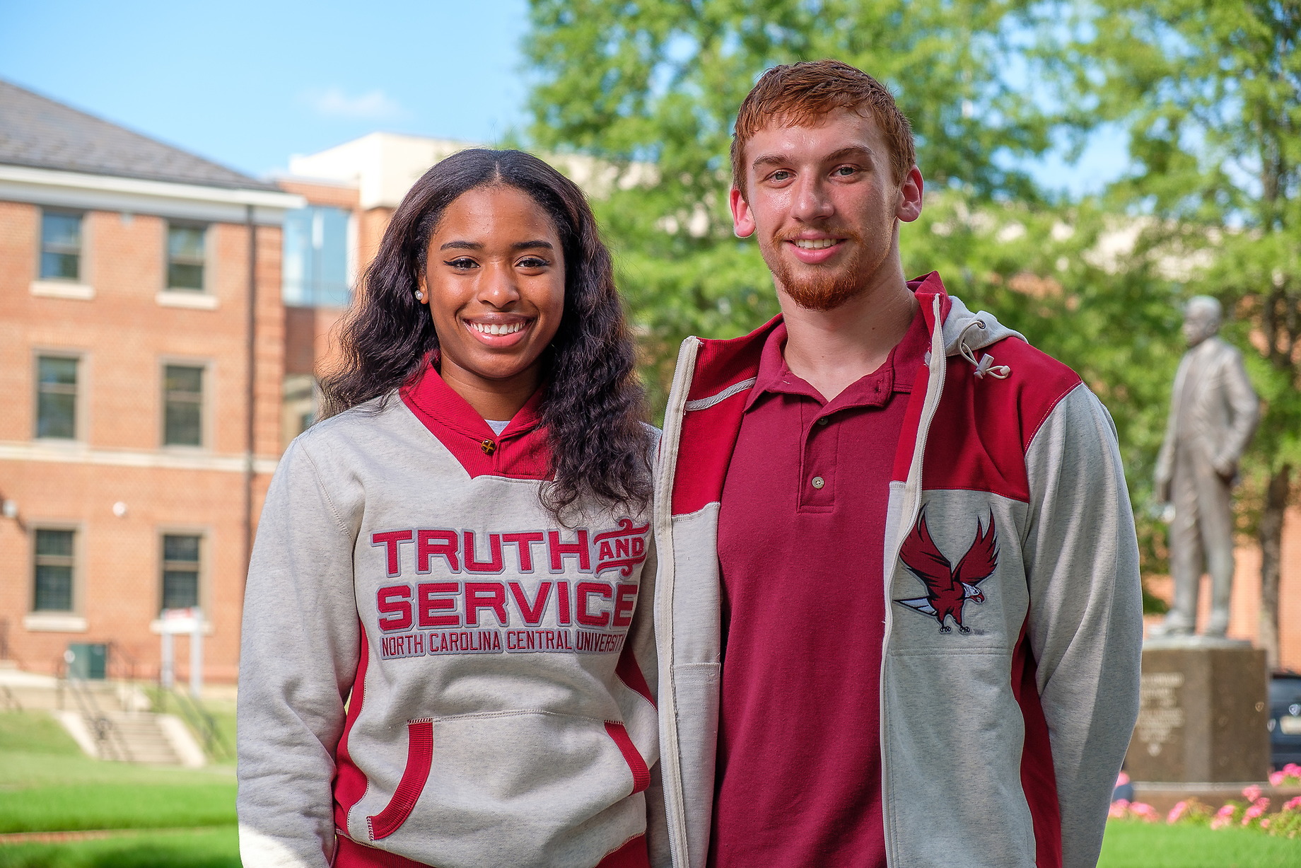 students standing outside smiling