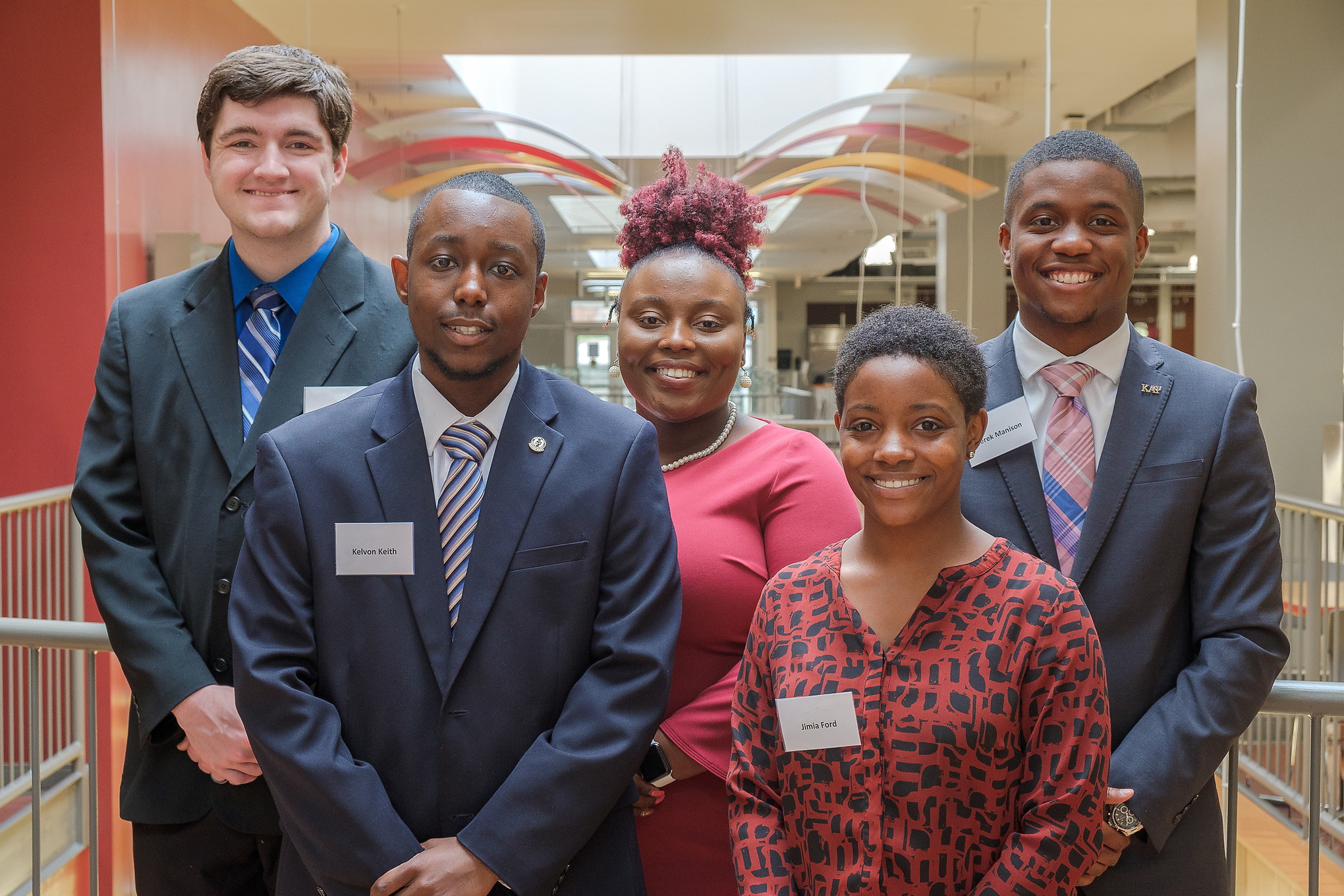 Students smiling at camera