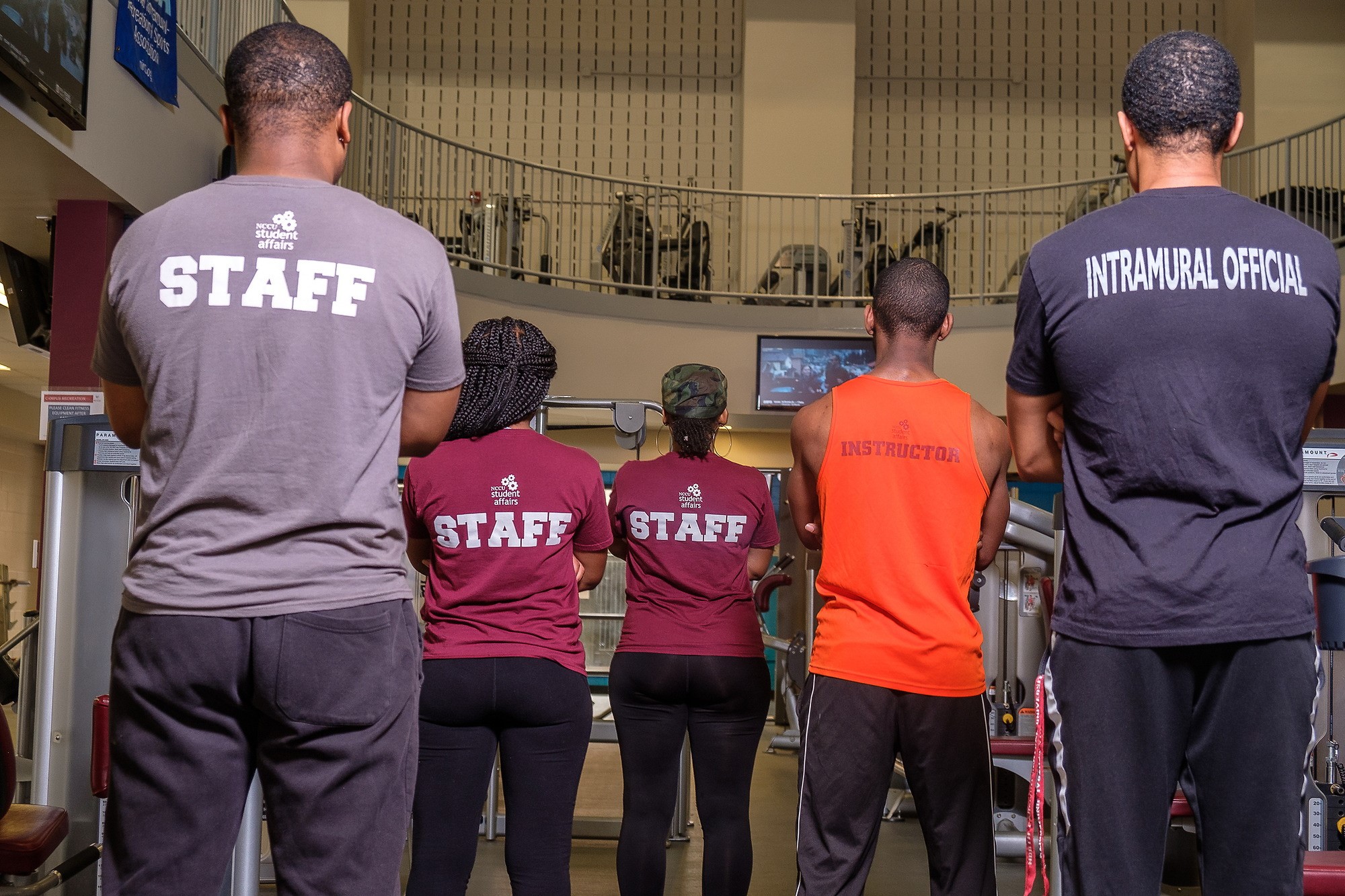Students are standing on fitness center