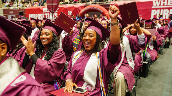 students celebrating at commencement