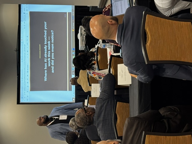 Image of Dr.Morris doing a presentation on AI