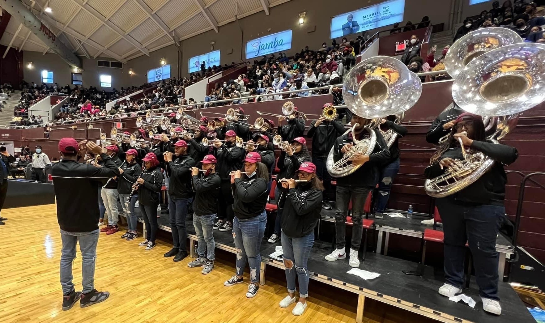 Pep band playing in basketball stadium