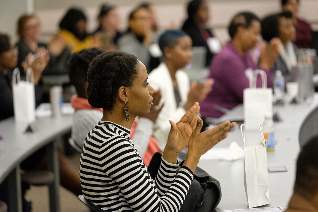 Applauding crowd at Symposium