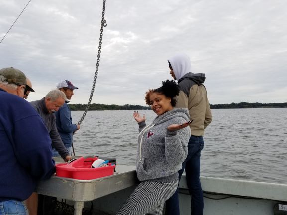Student exploring on boat