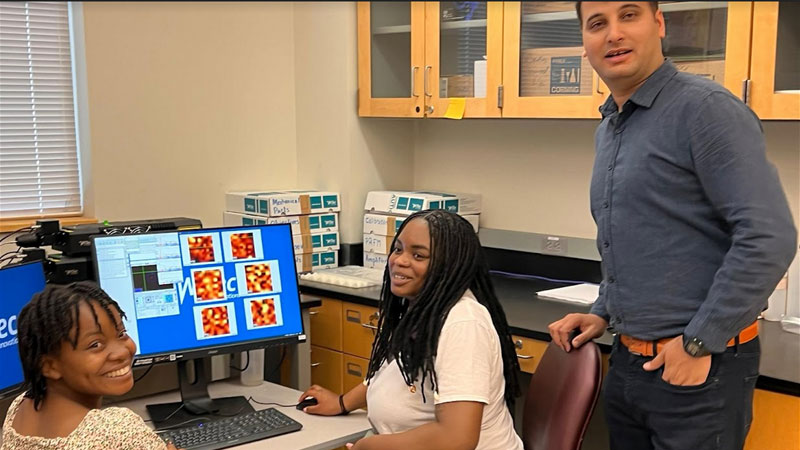 Dr. Karoui's students working on Scanning Confocal Raman spectroscopy