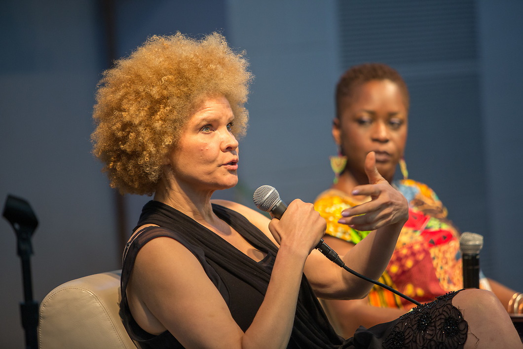 Women speaking at Symposium