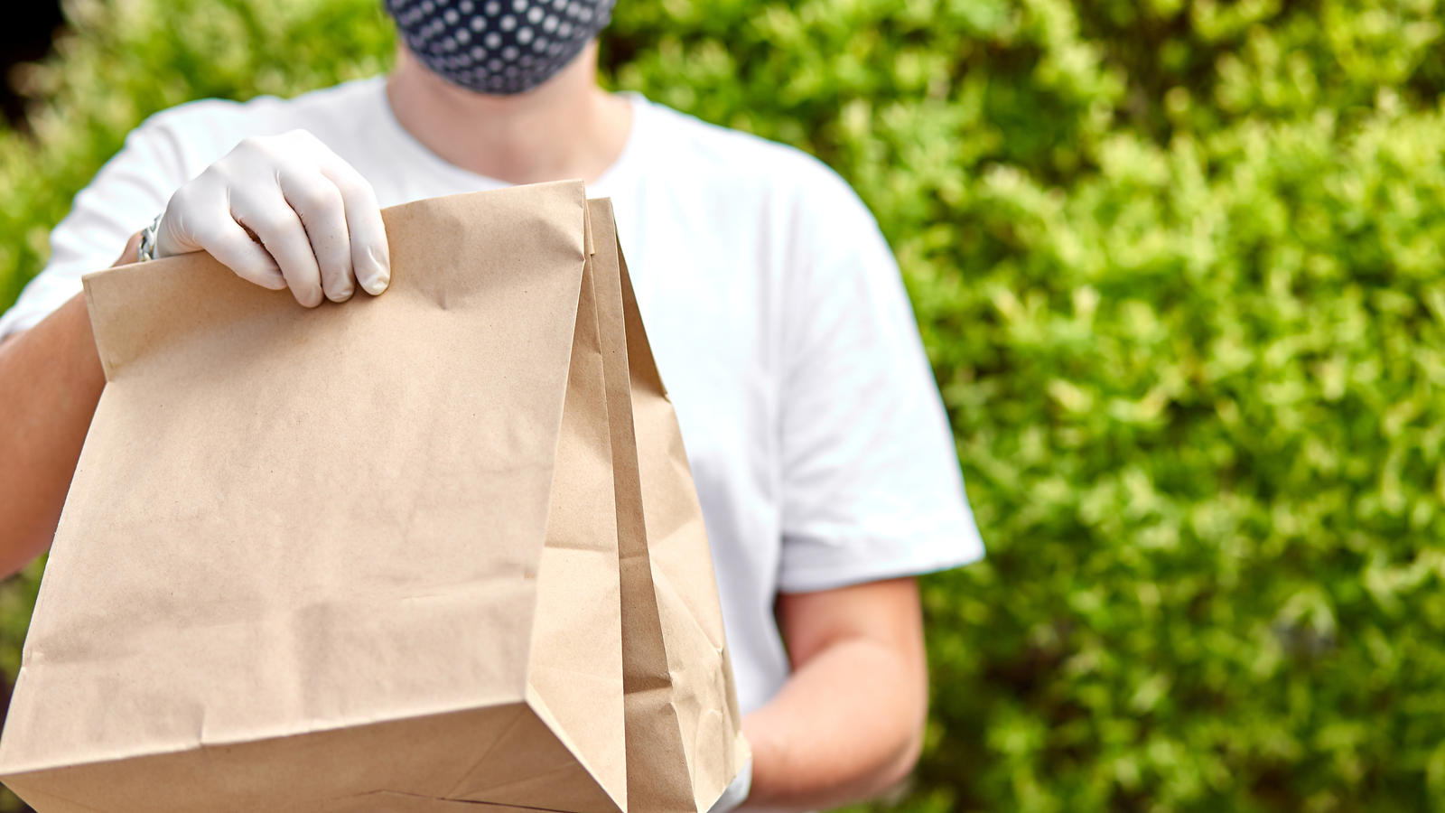 person with food bag