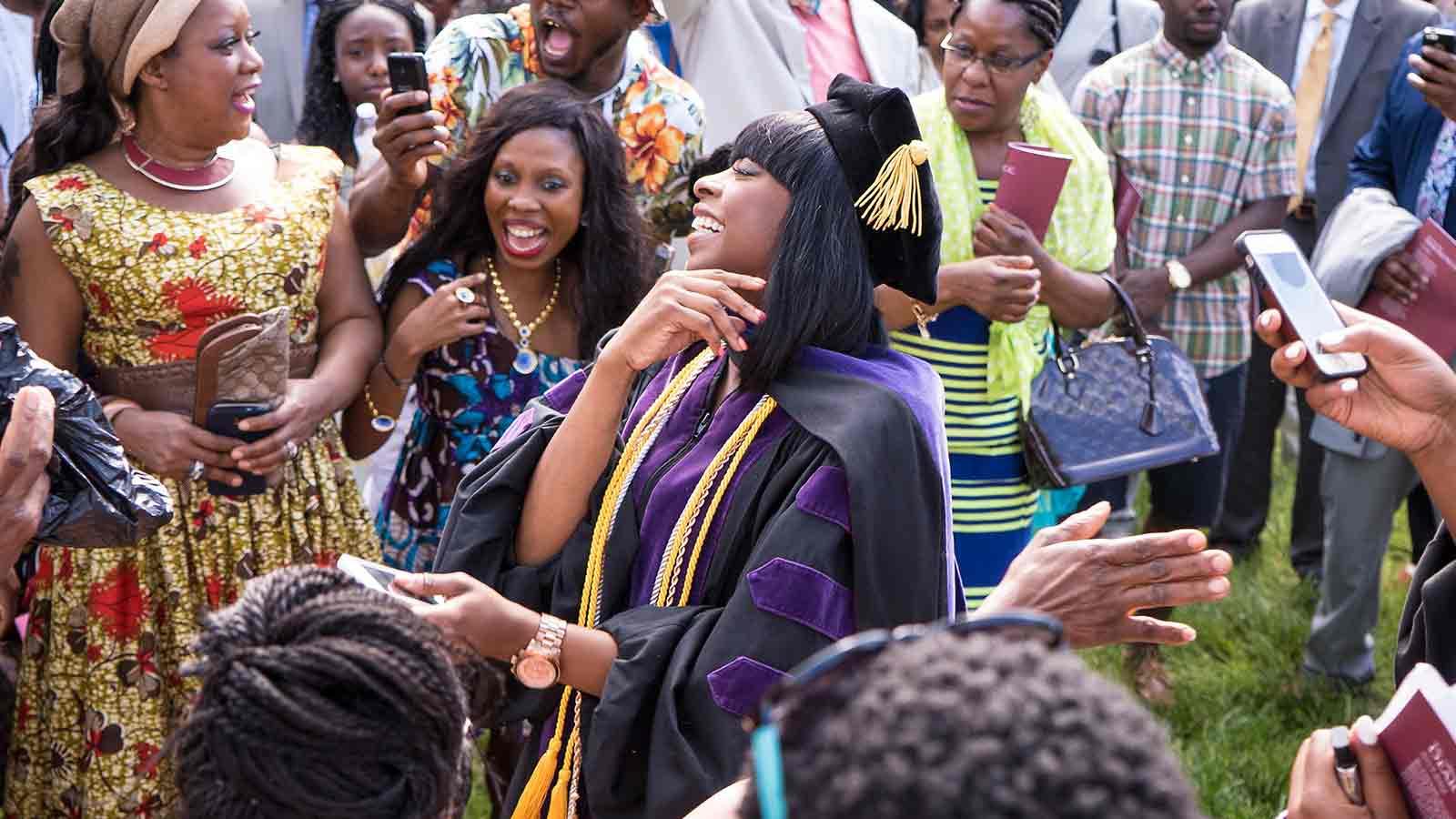 Music students celebrating, singing and dancing.