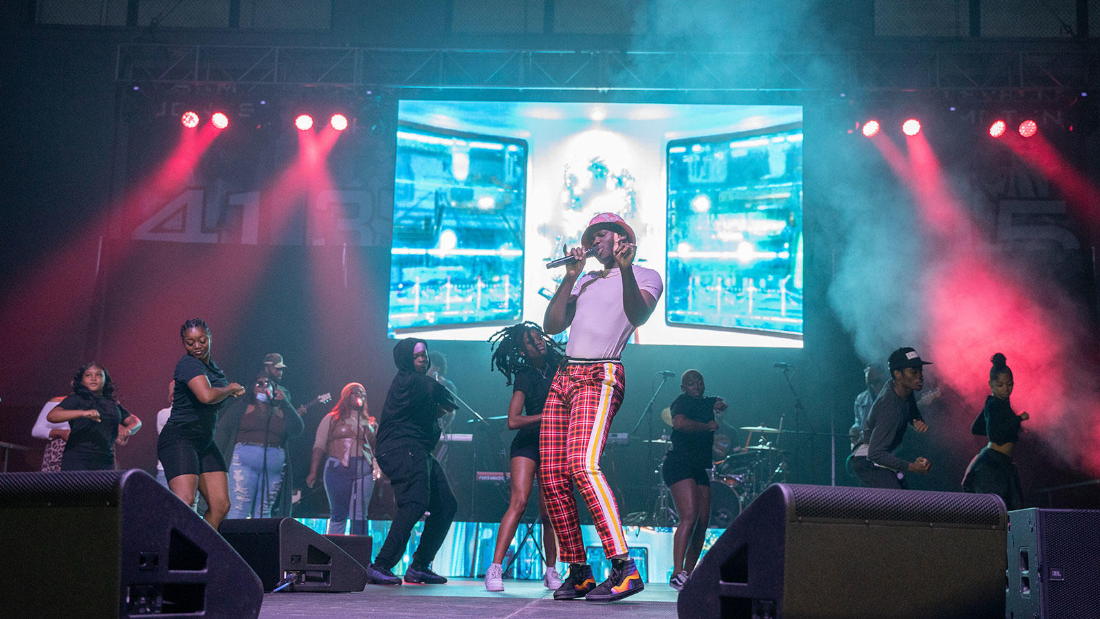 Person performing on the talent show stage