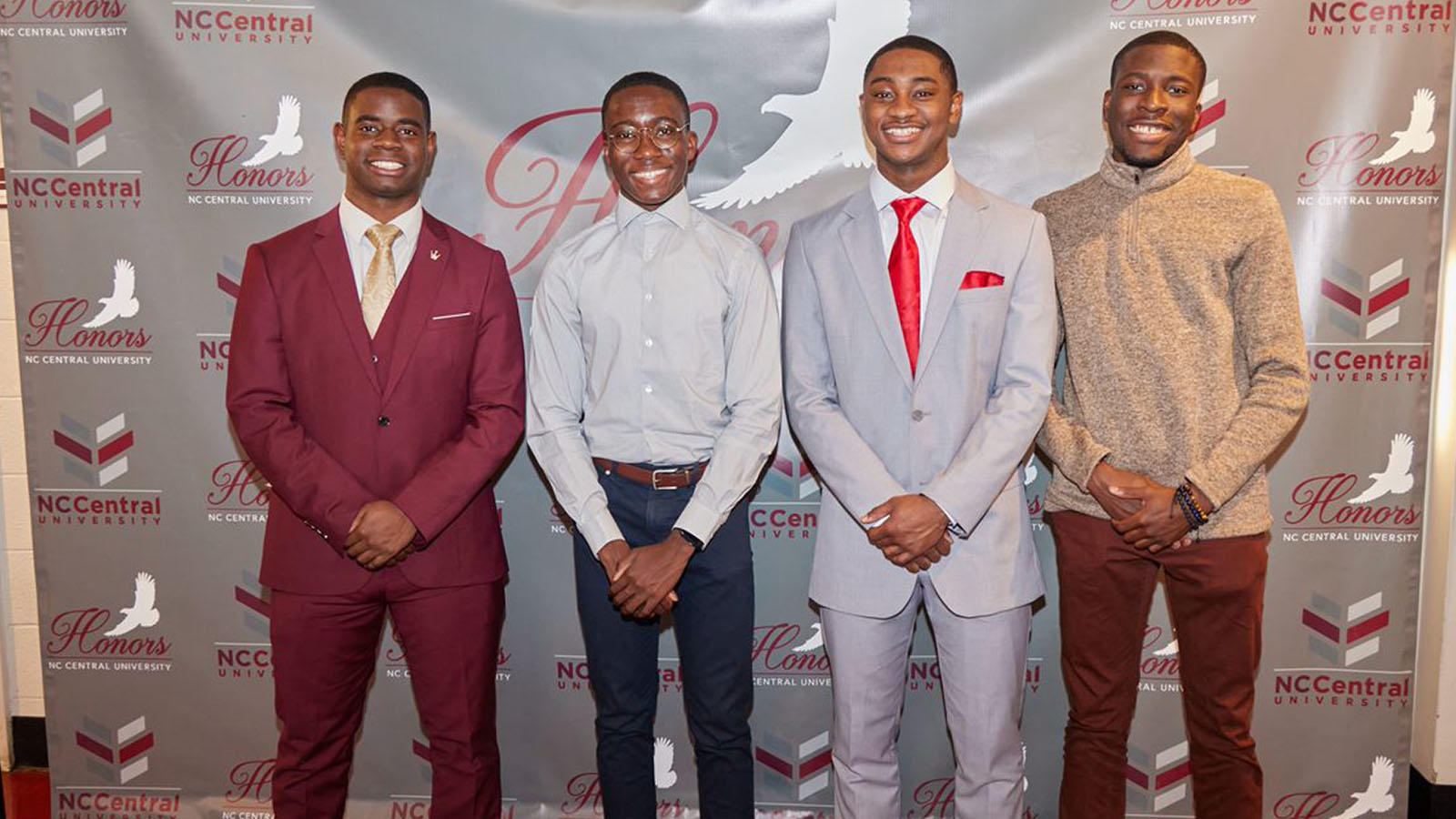Young men part of the UHP, dressed up in formal attire