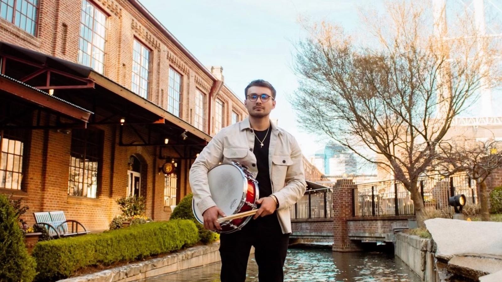 Scott Bruce holding a drum