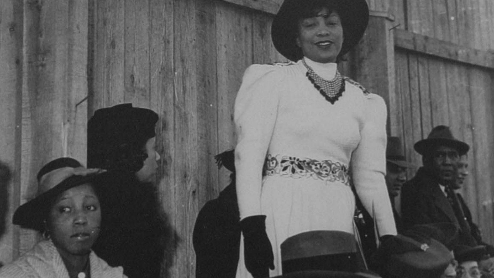 Zora Neale Hurston amongst a group of people