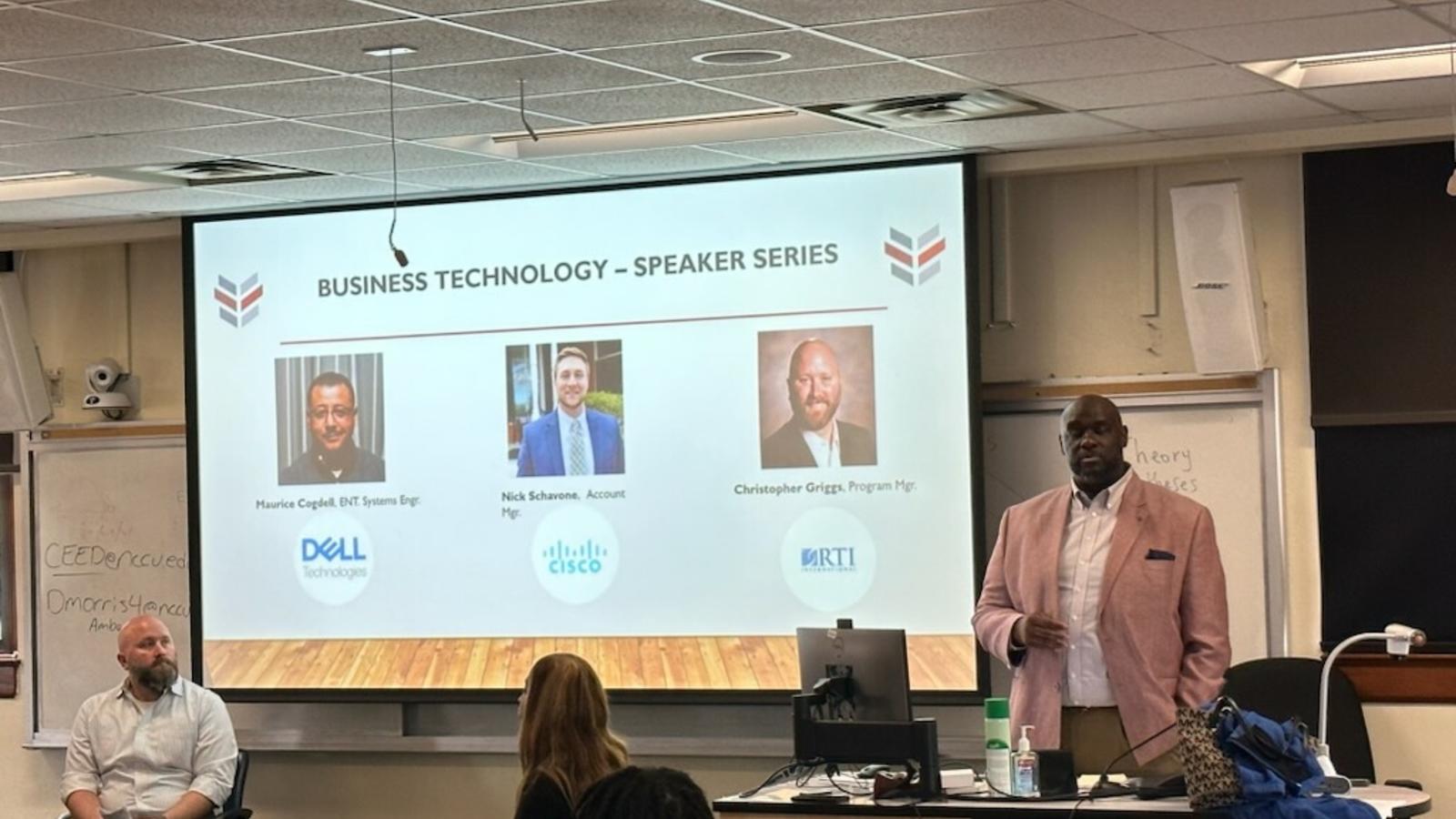 Business Technology Series projector screen and presentor