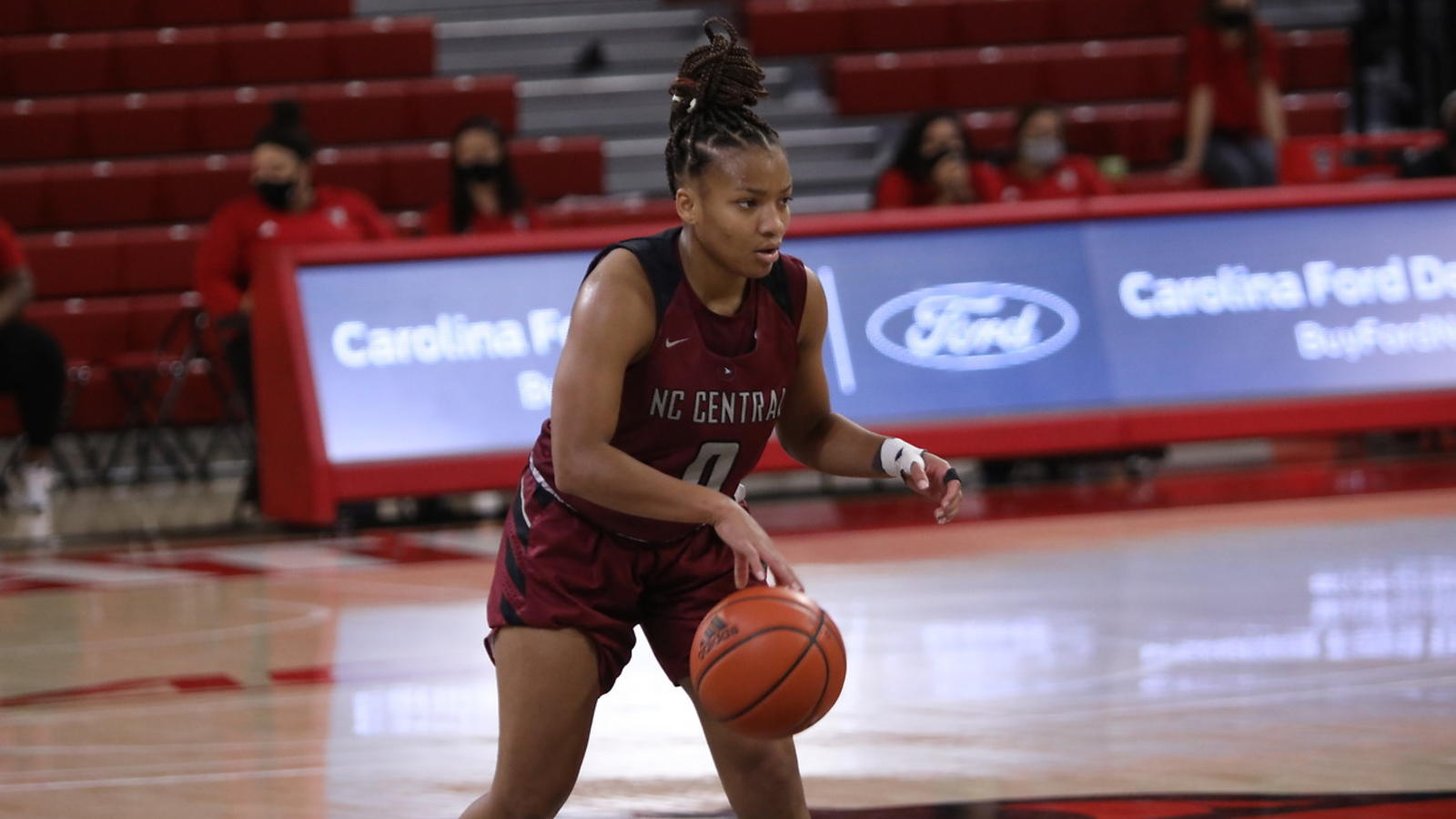A NCCU women's basketball player dribbling a basketball during a game