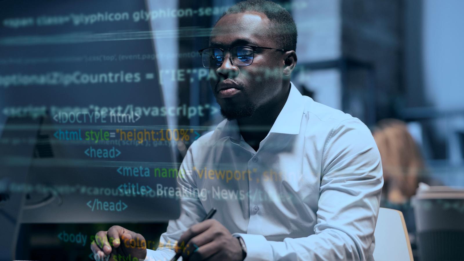 A guy looking at computer