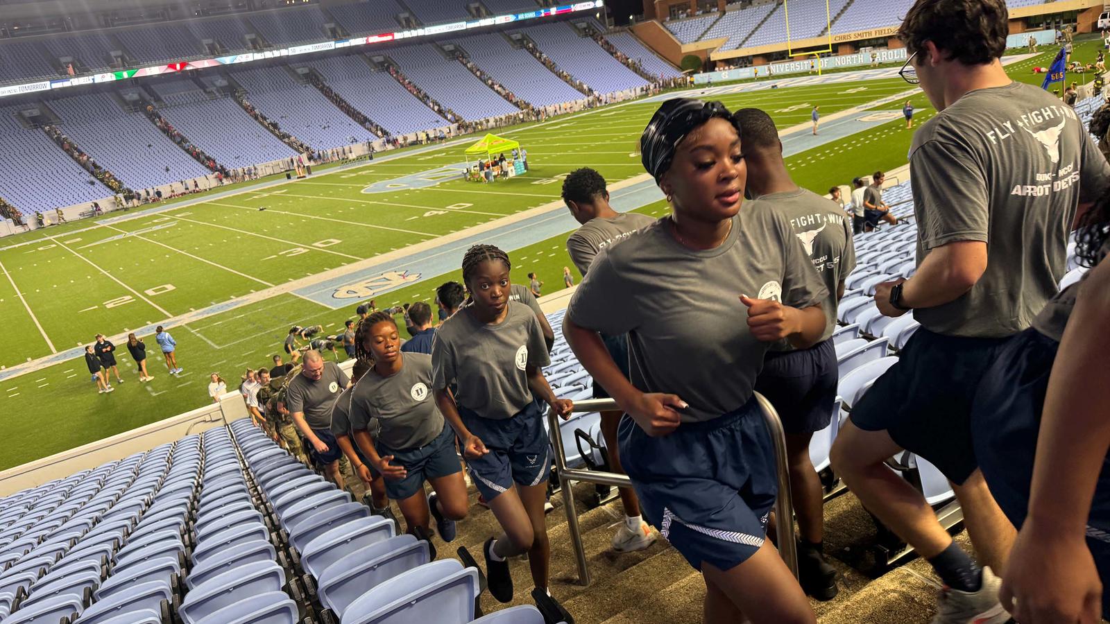 Students group in stadium