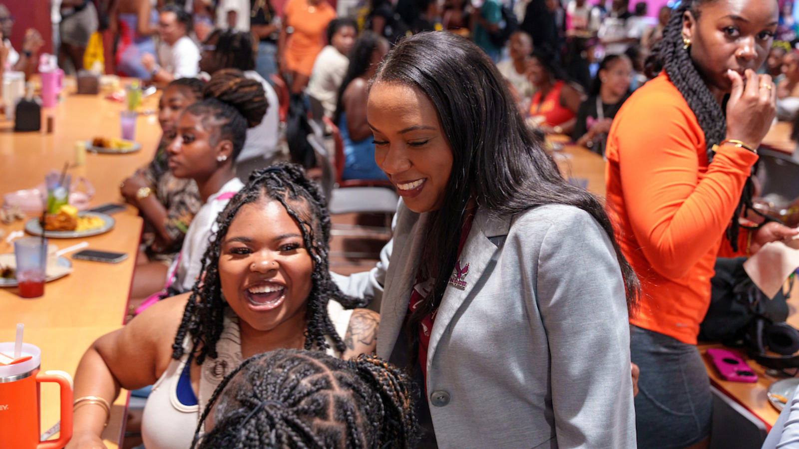 Chancellor with Students on Cafeteria