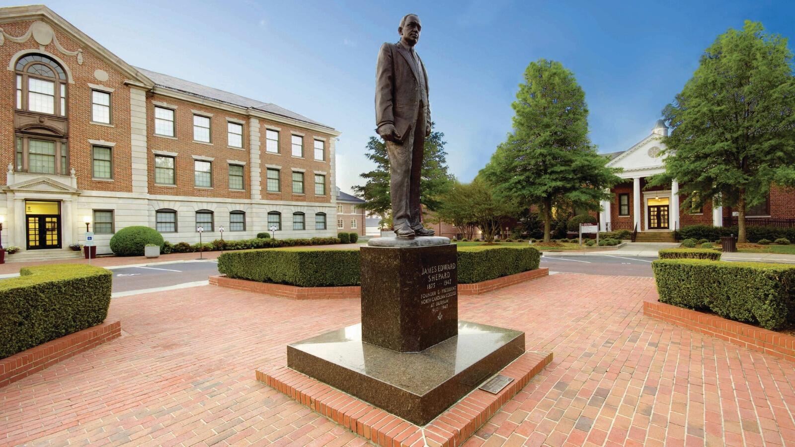 Dr. Shepard statue in the administration circle on campus