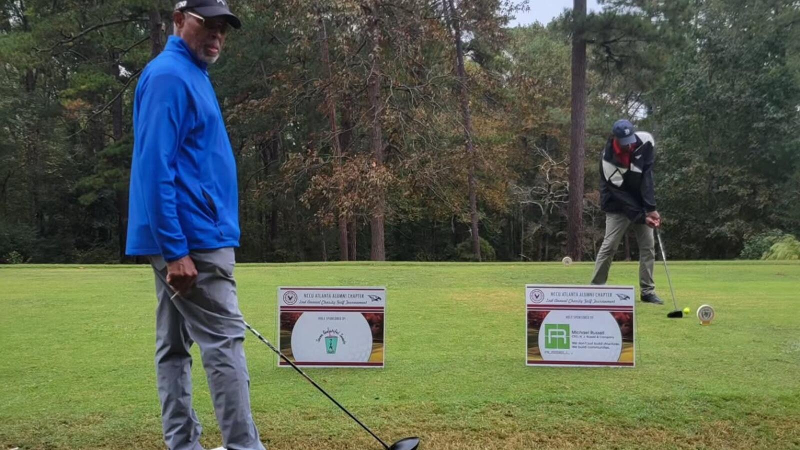 Alumni playing Golf