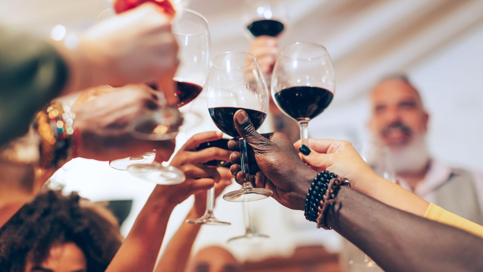 toasting with wine glasses