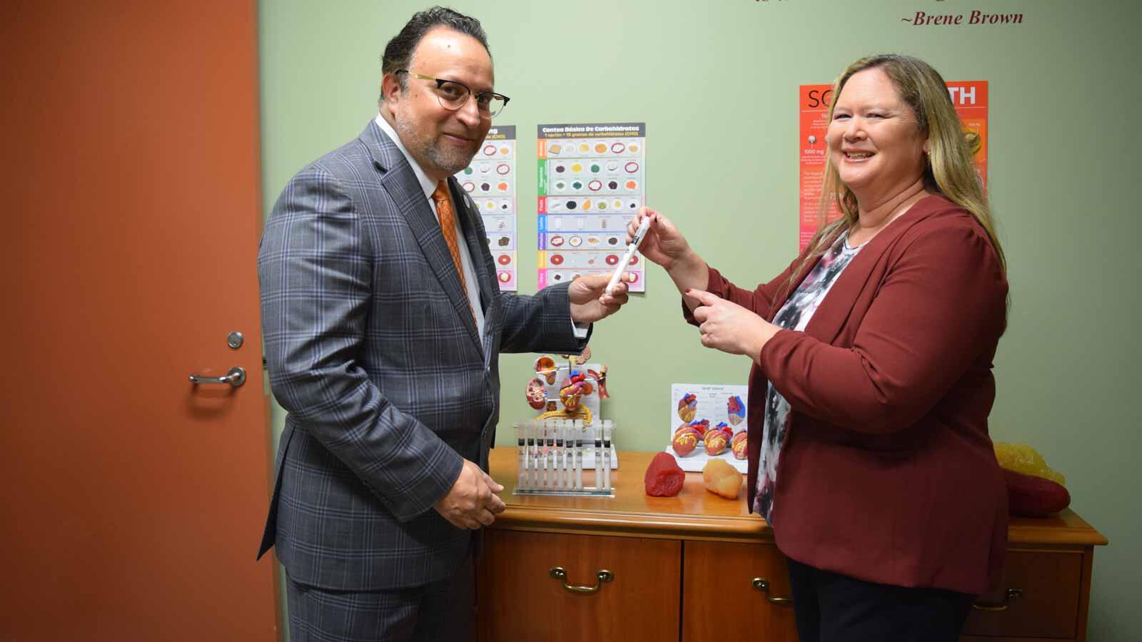 nutrition clinic team holding something together