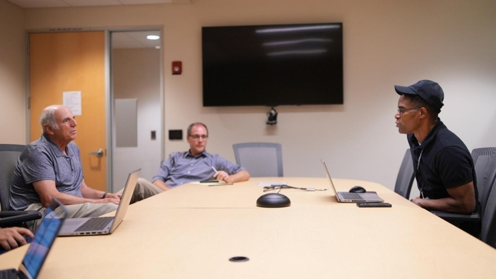 IHSEM team in a conference