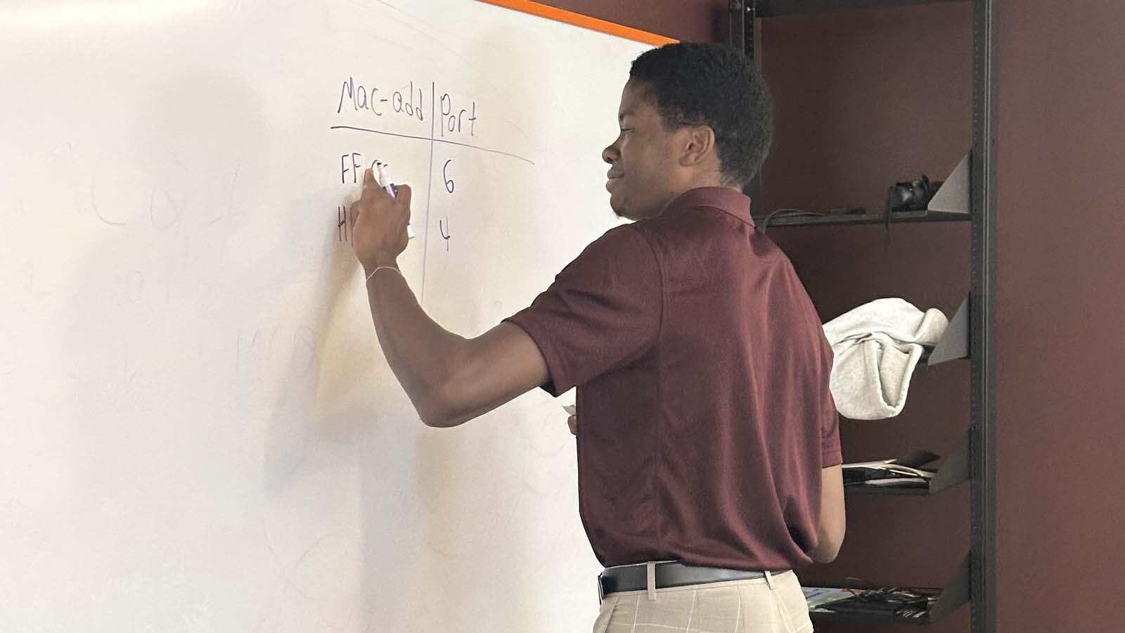 President of IT Eagles delivering an insightful explanation of how computers communicate with one another.