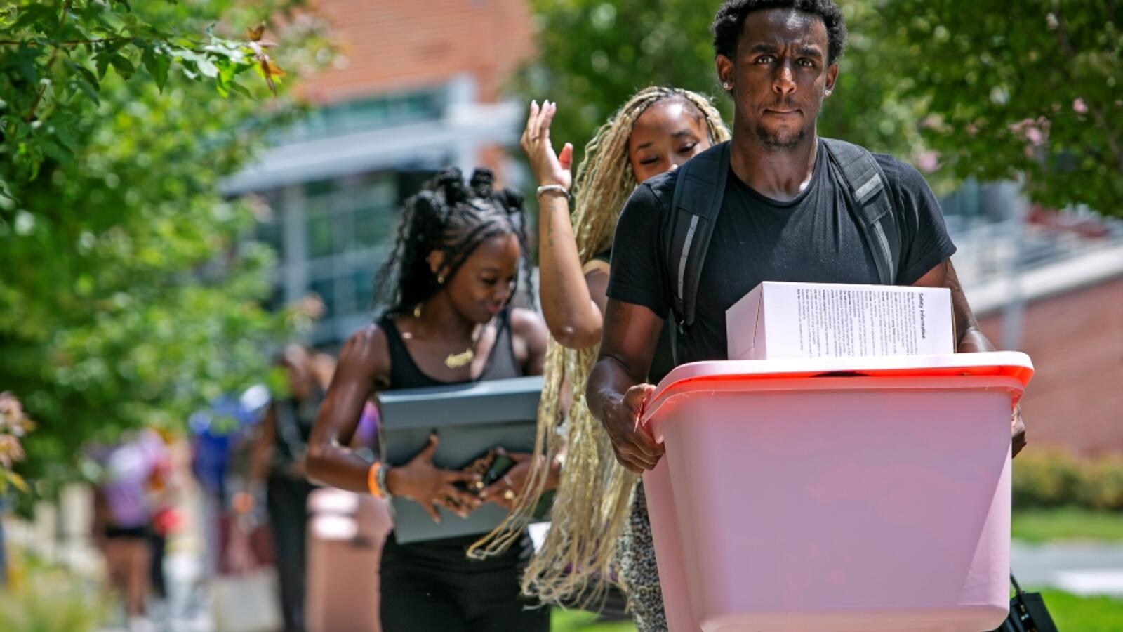 Students with Luggage