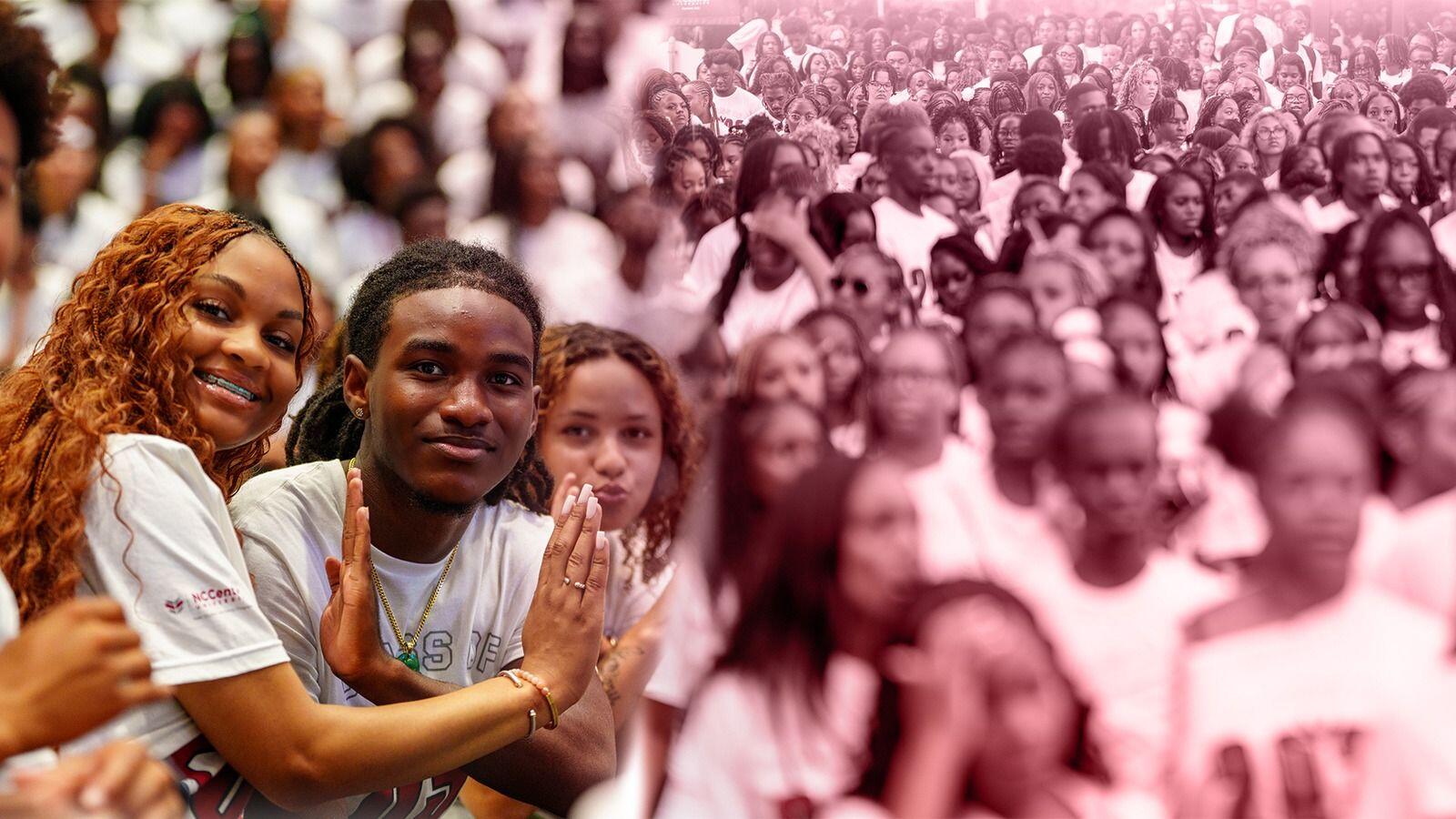 North Carolina Central University students showcase Eagle pride and school spirit during a campus gathering, featuring smiling students in white NCCU shirts against a large crowd of fellow Eagles.