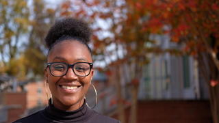 Student Outside Smiling