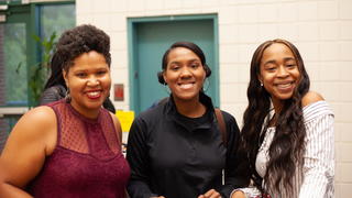 3 students standing together