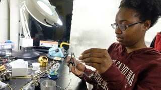 BRITE student working in lab