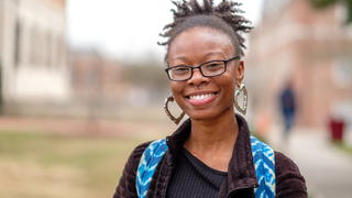 Student Smiling outside at NCCU