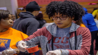 Girl doing community service.
