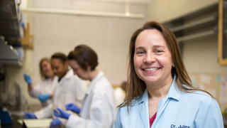 Julie Horvath in a lab room